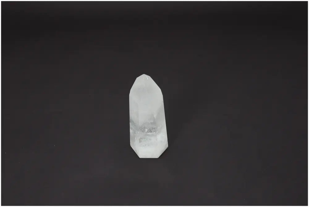 Lemurian Quartz Obelisk on dark background showcasing unique energy-enhancing properties and chakra alignment benefits.