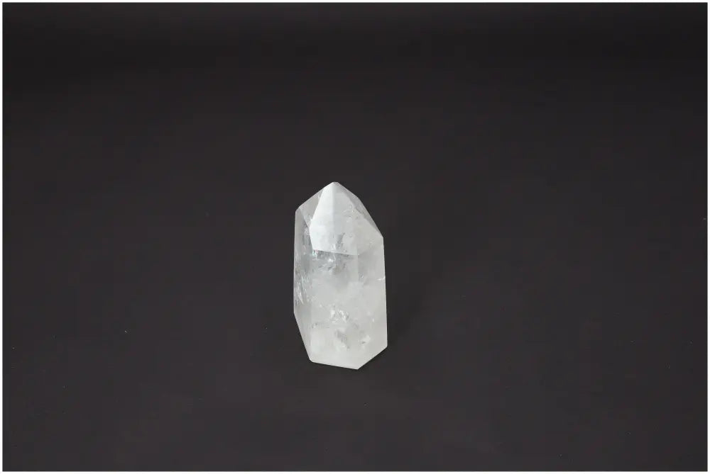Lemurian Quartz Obelisk on black background, highlighting its unique spiritual and energetic properties for chakra and zodiac support.