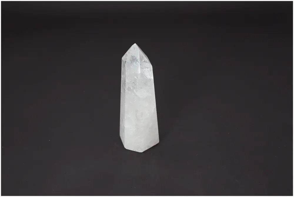 Lemurian Quartz Obelisk with unique energetic properties for chakra alignment and spiritual enhancement.