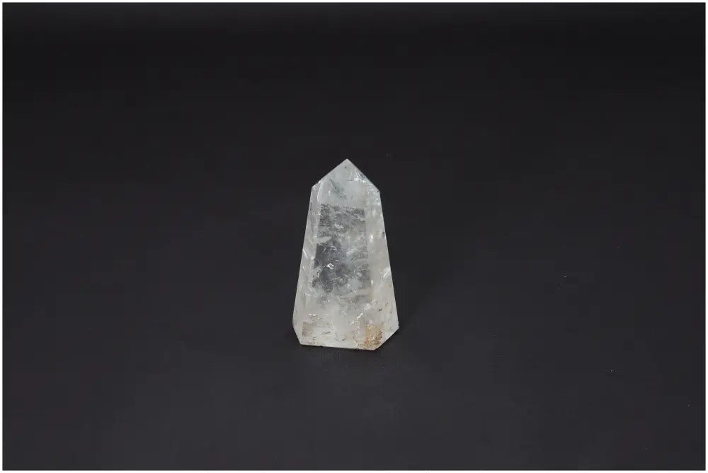 Lemurian Quartz Obelisk on black background, highlighting unique energetic and spiritual properties tied to chakras and zodiac signs.