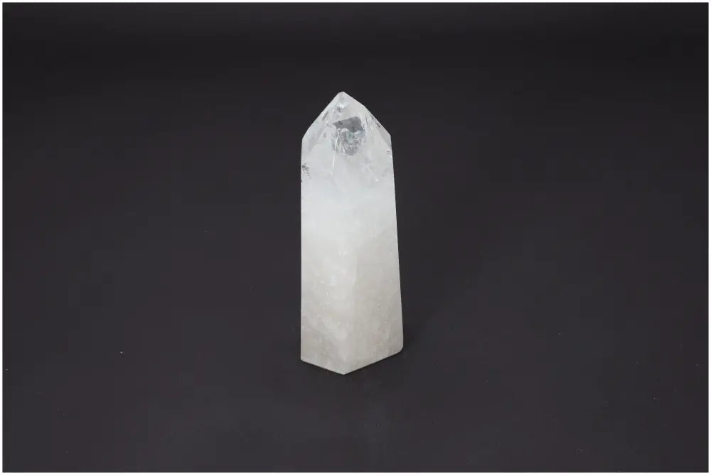Lemurian Quartz Obelisk with unique energetic properties for chakras and zodiac alignment, enhancing spiritual well-being.