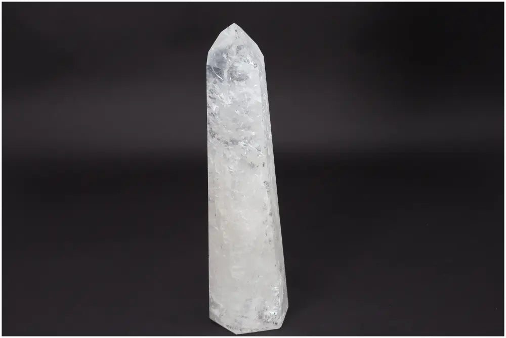 Lemurian Quartz Obelisk crystal for clarity, balance, and personal growth against a dark background.