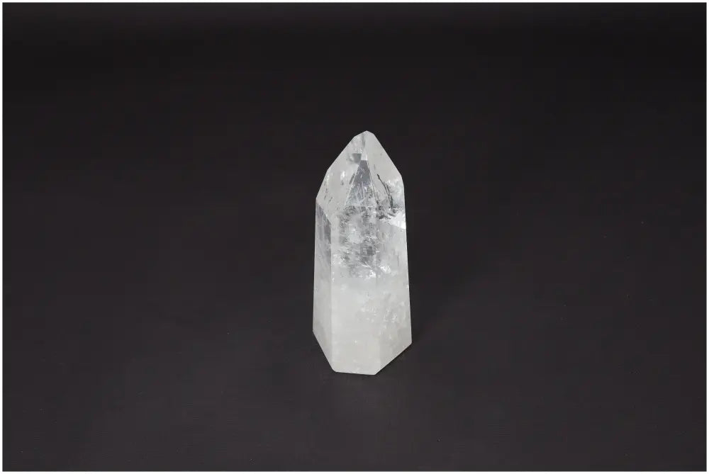 Lemurian Quartz Obelisk, Clear Quartz crystal for clarity and healing, displayed on a dark background.