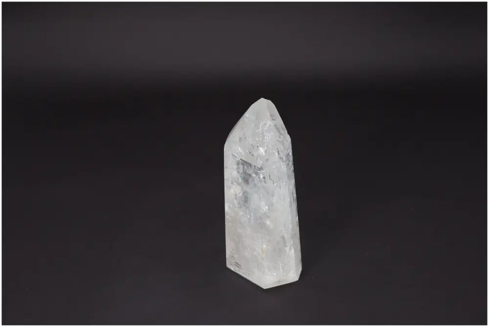 Lemurian Quartz Obelisk - Clear Quartz crystal for clarity, balance, and personal growth on a black background.