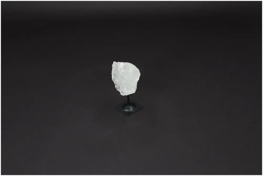 Lemurian Quartz on a metal stand, enhancing energy and clarity. Ethically sourced, ideal for balance and growth.