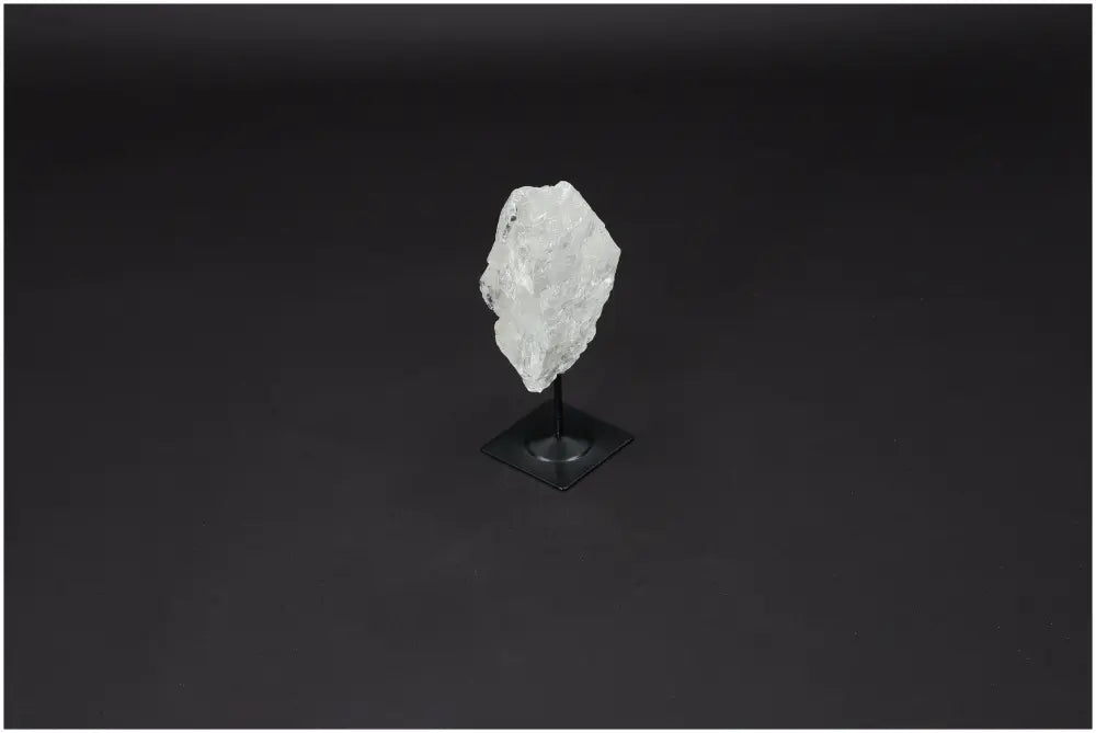 Lemurian Quartz on metal stand, Clear Quartz crystal for clarity and personal growth, ethically sourced and naturally formed stone.