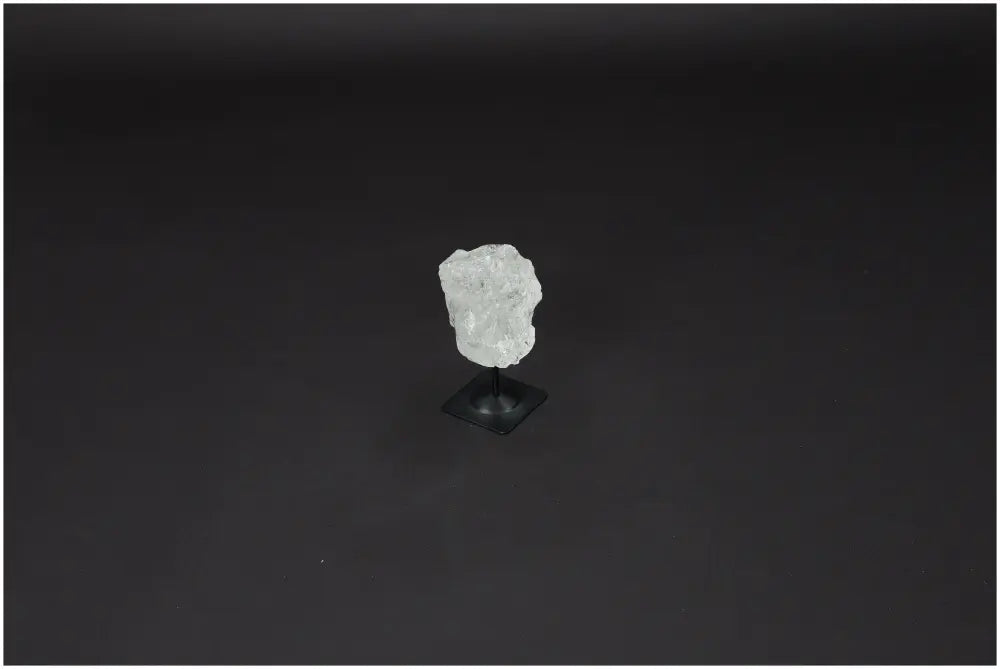 Lemurian Quartz crystal on a metal stand, ideal for energy amplification and growth, ethically sourced and naturally formed.