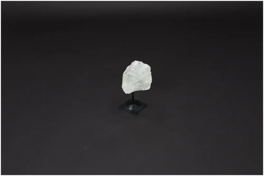 Lemurian Quartz crystal on metal stand, enhancing clarity and balance, known as the 'Master Healer' for personal growth.