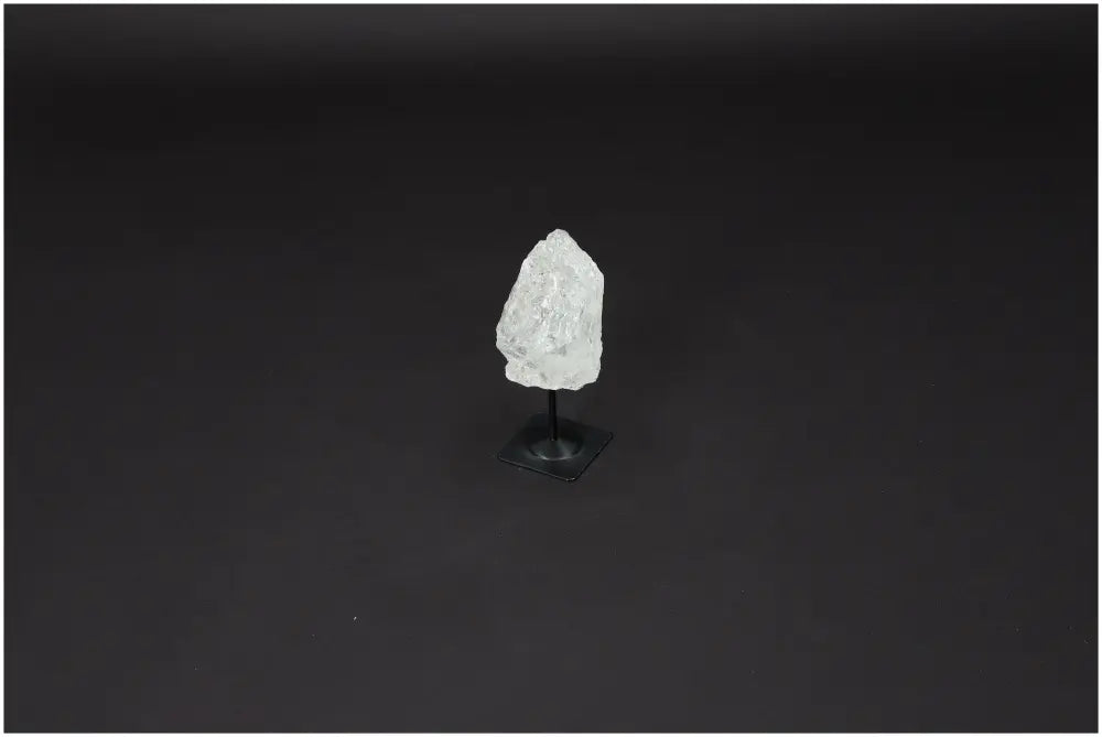 Lemurian Quartz crystal on metal stand for clarity and balance, known as the Master Healer. Enhance energy and intentions.