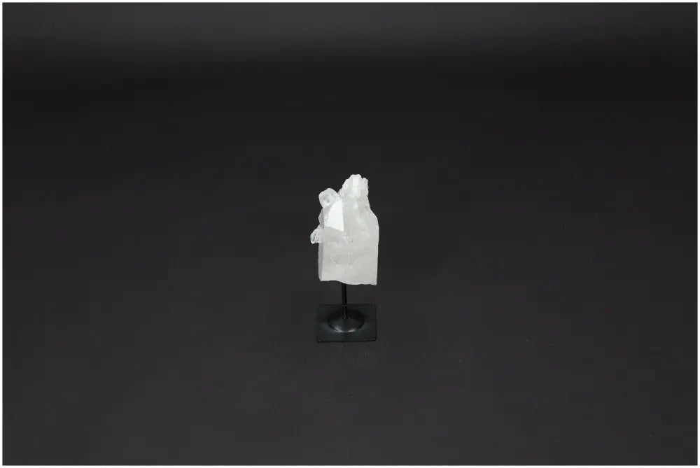 Lemurian Quartz on metal stand, showcasing clear crystal's natural beauty and healing properties, perfect for clarity and balance.