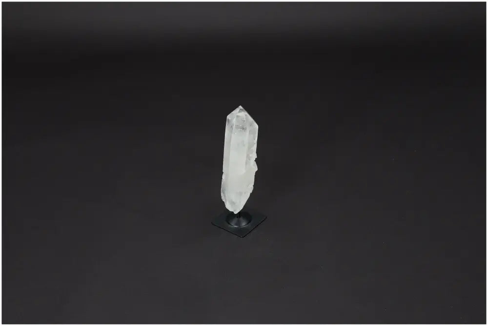 Lemurian Quartz crystal on metal stand to enhance clarity, balance, and personal growth, known as the 'Master Healer.'