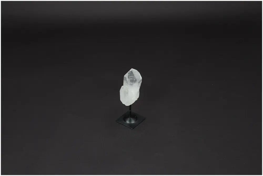 Lemurian Quartz on metal stand, ideal for purification, harmonizing energy, and neutralizing negative vibrations in any space.