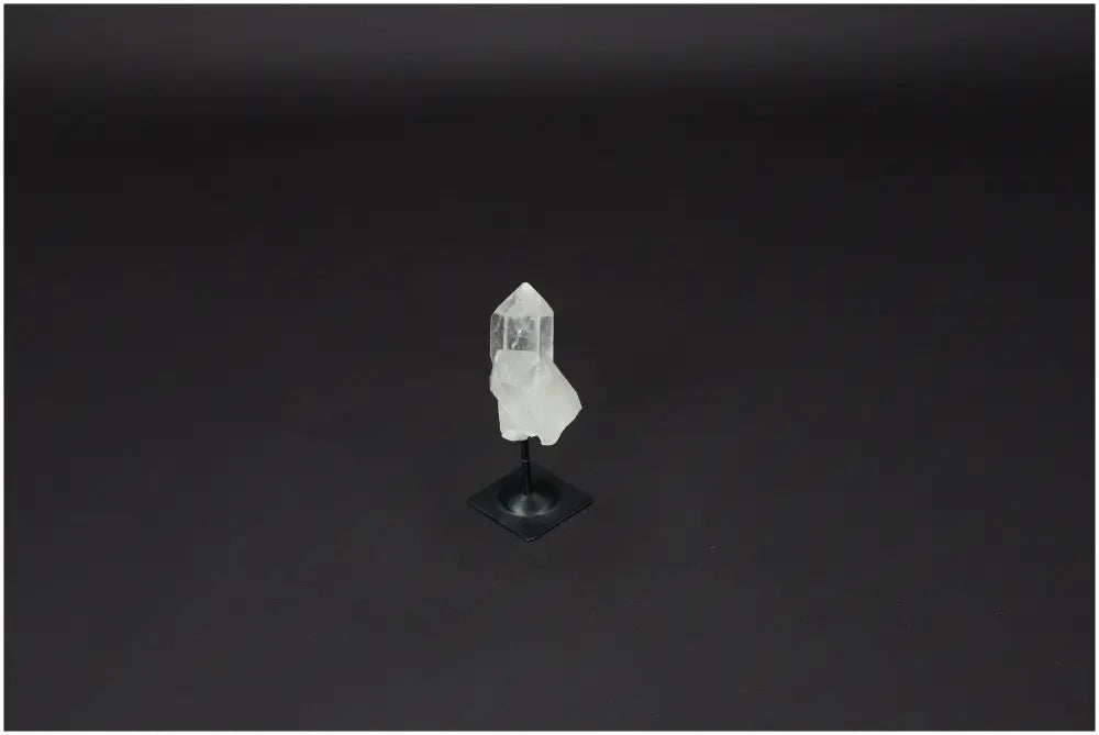 Lemurian Quartz on a sleek metal stand, ideal for energy purification and neutralizing electromagnetic radiation in your space.