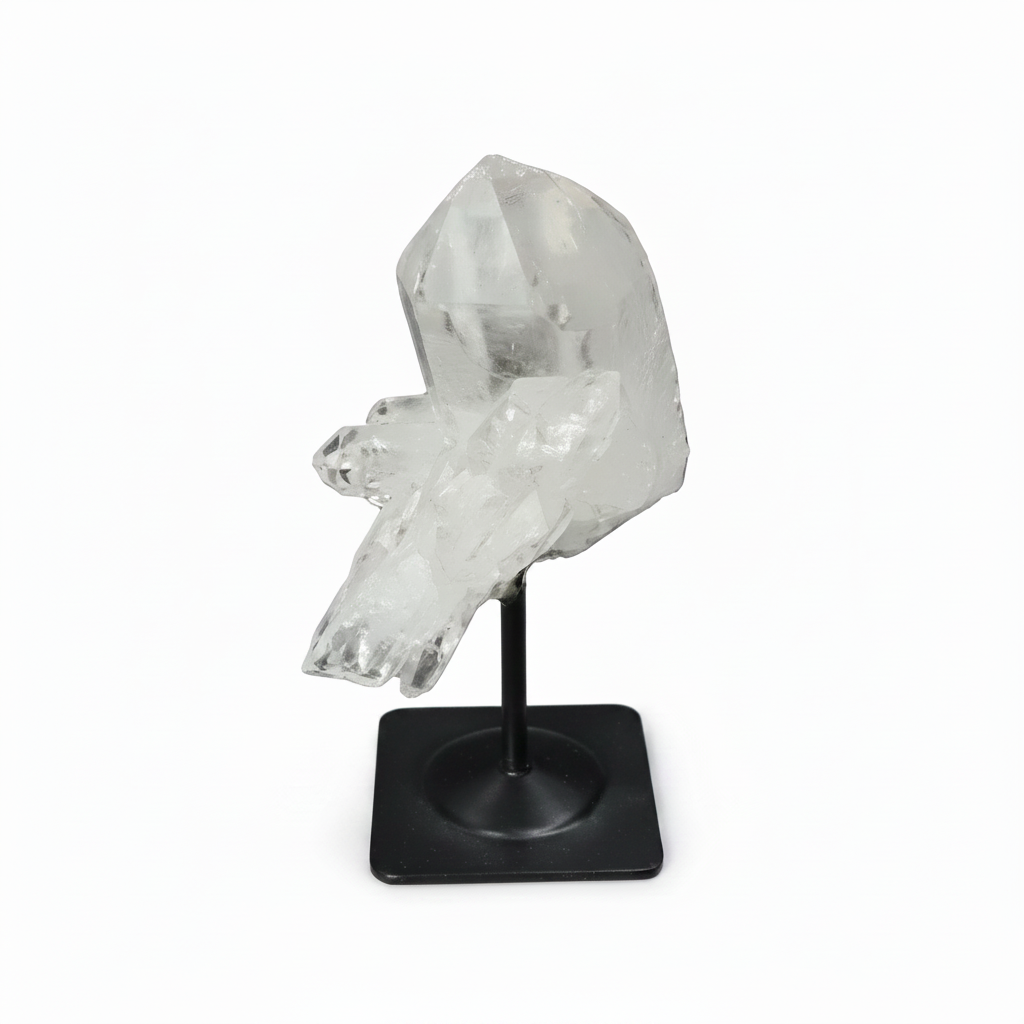 Lemurian Quartz on metal stand against dark background, known for purification, harmonizing body and mind, ideal for everyday use.