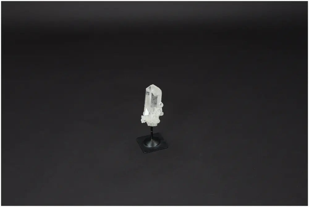 Lemurian Quartz on metal stand, a powerful purification stone to harmonize mind and energy, neutralizing negative vibrations and EMF.