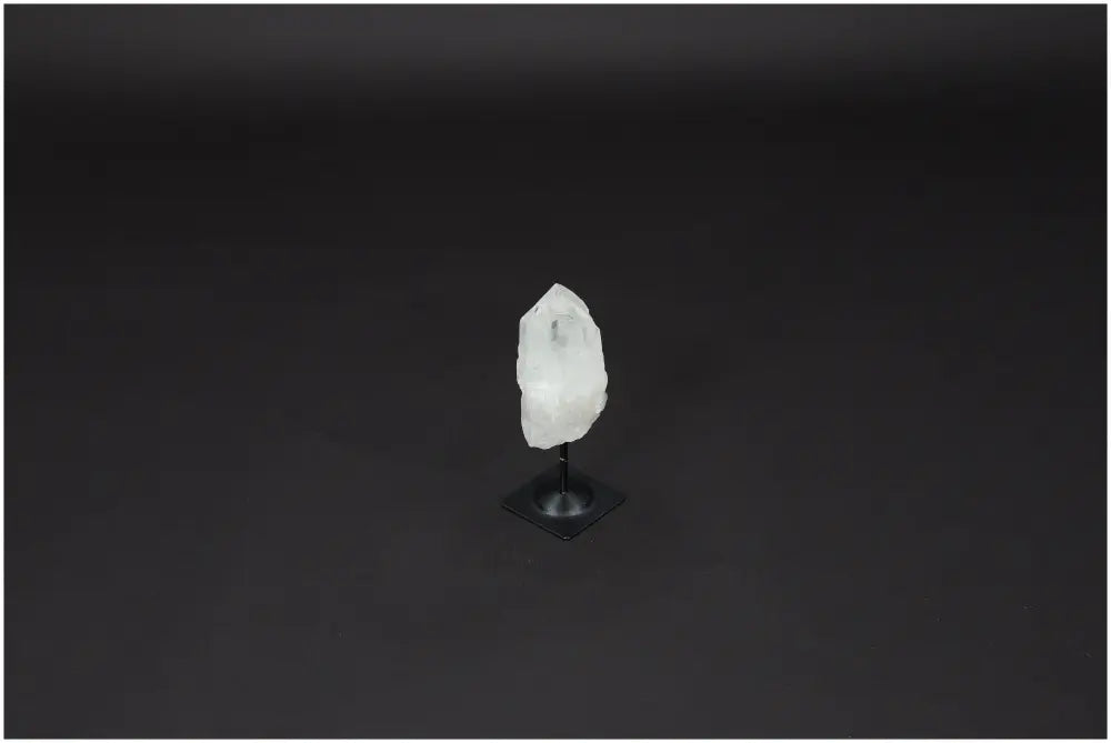 Lemurian Quartz on metal stand, clear crystal for purification and harmonizing energy, absorbs negative vibrations and radiation.