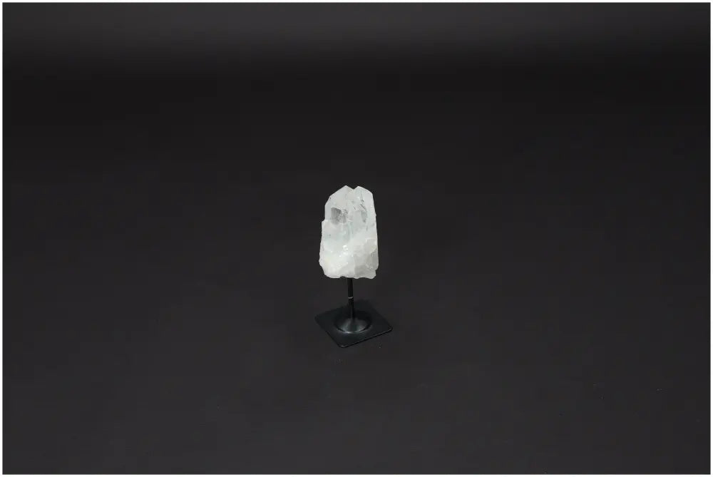 Lemurian Quartz crystal on metal stand, perfect for purifying and harmonizing energy, neutralizing negative vibrations and electromagnetic radiation.