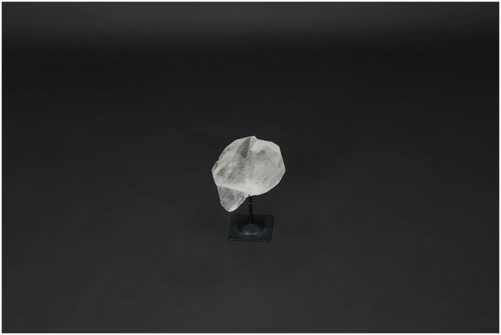 Lemurian Quartz on metal stand, known for purification, harmonizing energy, and neutralizing negative vibrations and electromagnetic radiation.