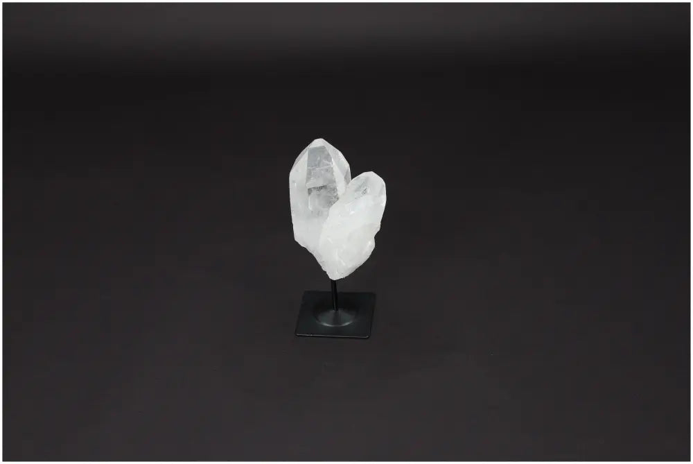 Lemurian Quartz on metal stand, powerful clear quartz for purification and harmonizing energy, ideal for neutralizing negative vibrations.