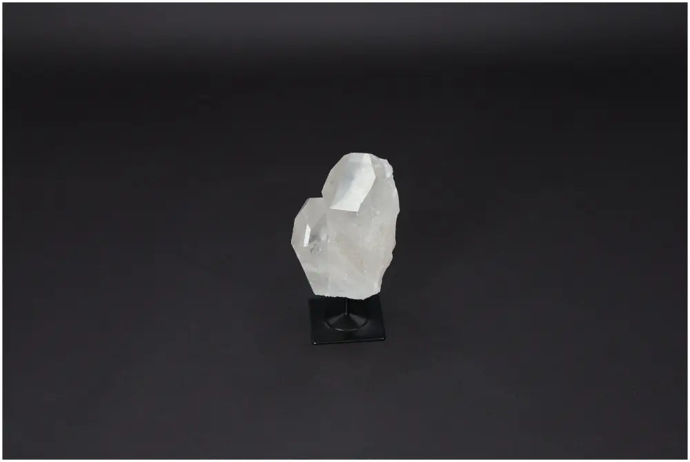 Lemurian Quartz on metal stand, perfect for energy purification and harmonizing negative vibrations, ideal for home and office.