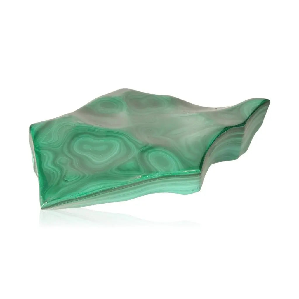Polished malachite gemstone with swirling green patterns, known as the stone of nature, symbolizing soothing energy and transformation.