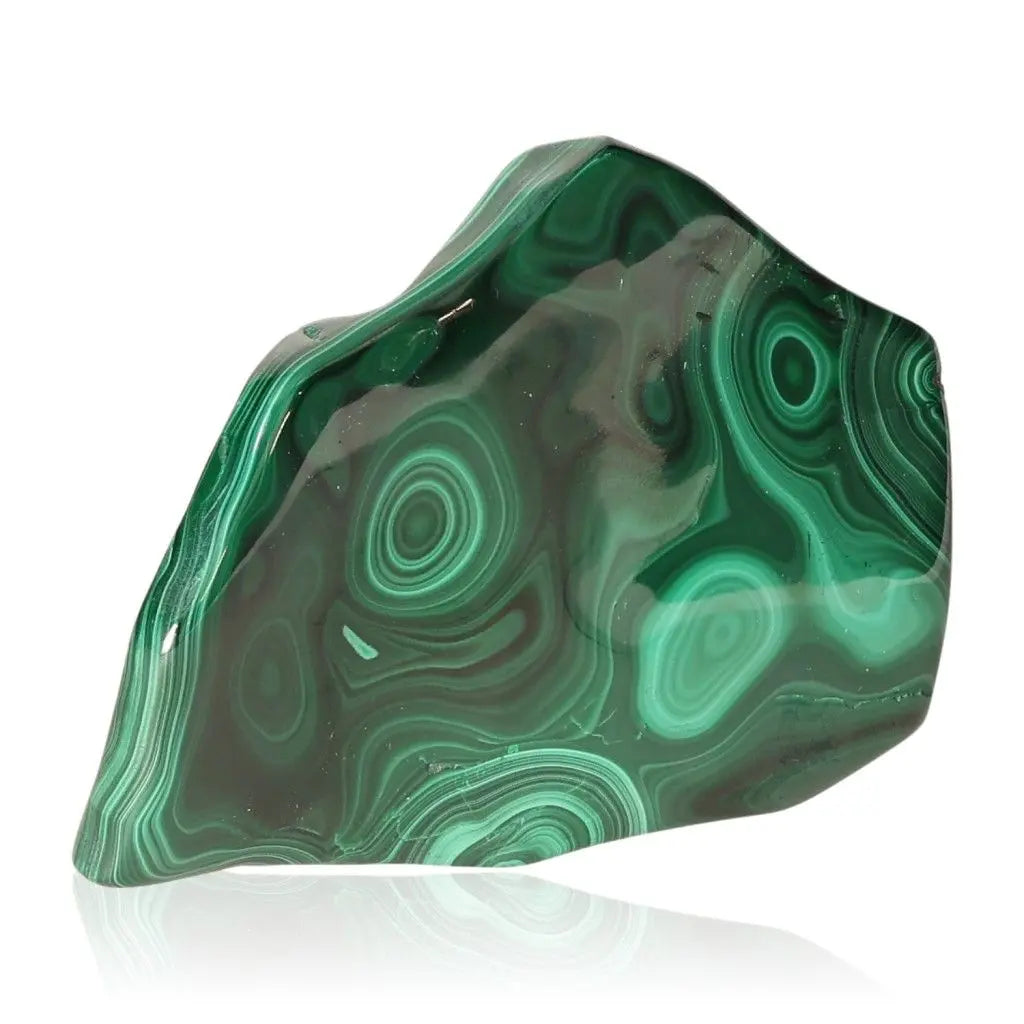 Vibrant malachite gemstone with swirling patterns, known for its soothing energy and empowering properties. Perfect for any collection.