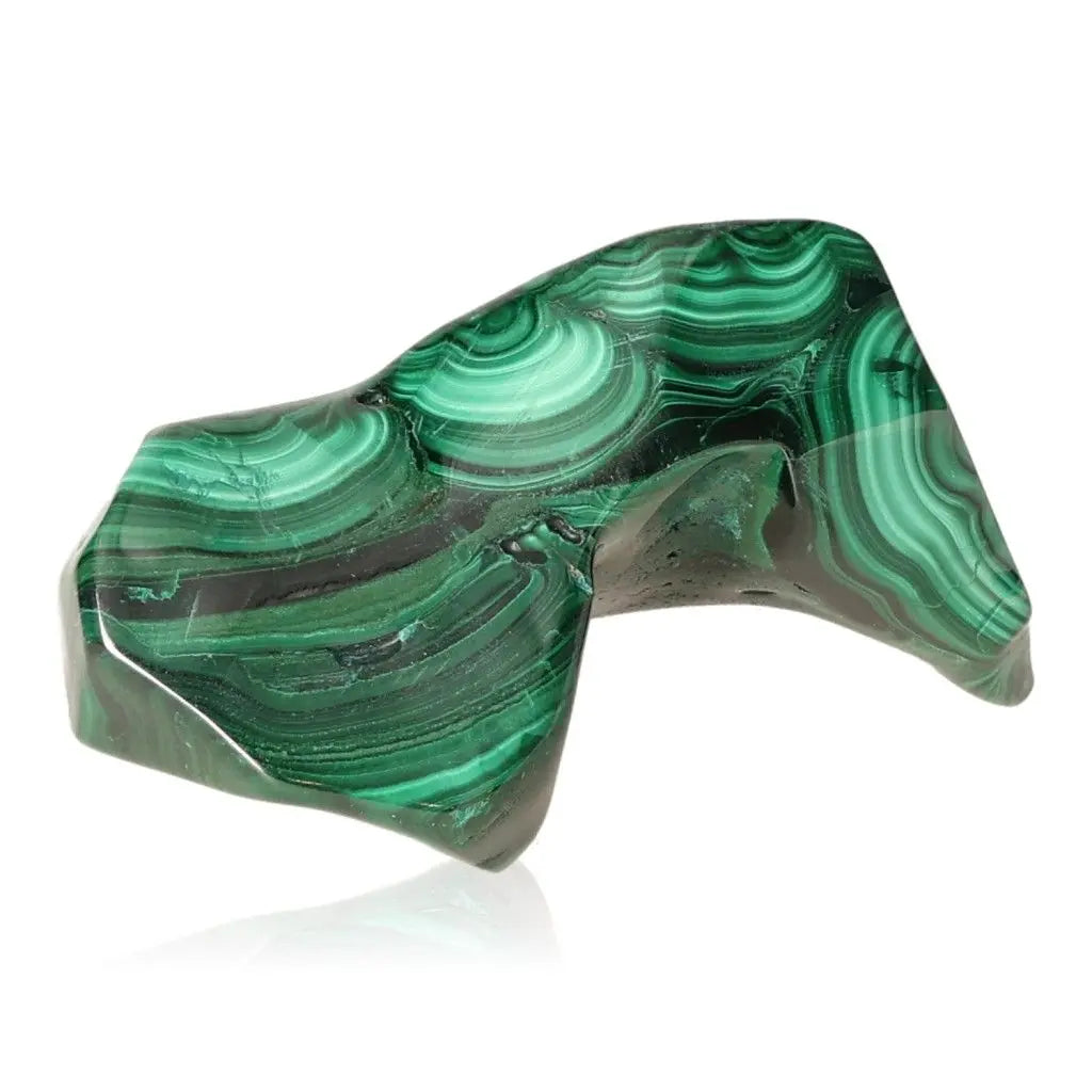 Malachite gemstone with deep green hues, known for its calming and energizing properties, capturing the essence of nature's beauty.