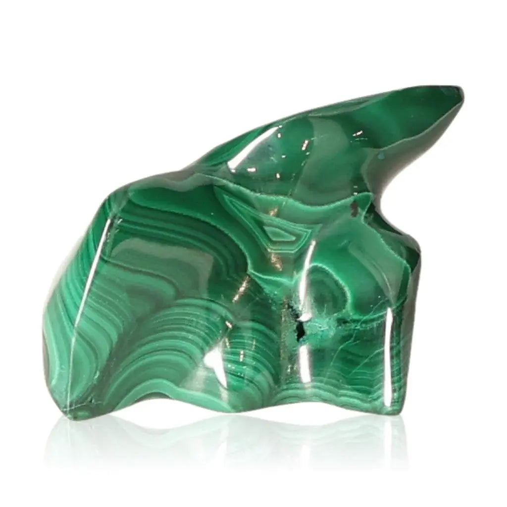 Polished Malachite stone, known for its soothing energy, promotes courage and optimism, ideal for navigating life changes with harmony.