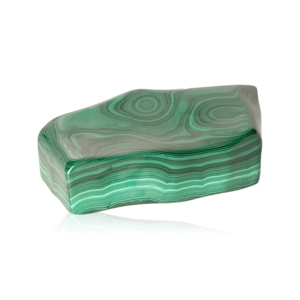 Malachite stone with lush green swirls, symbolizing balance and rejuvenation, perfect for inner peace and optimism.