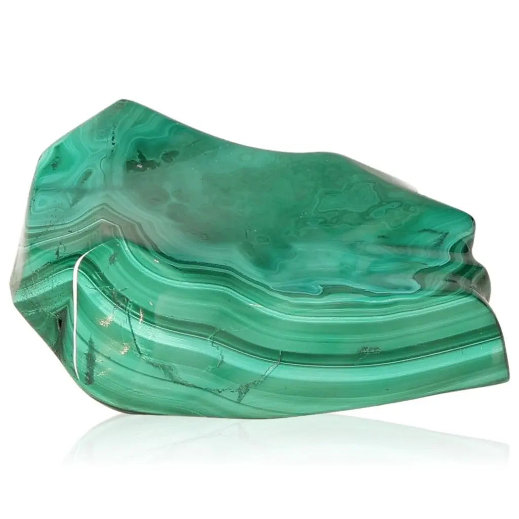 Vibrant green Malachite gemstone with swirling patterns, symbolizing tranquility and natural energy.