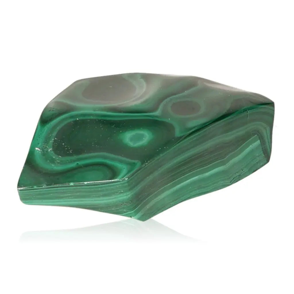Polished green Malachite gemstone displaying its natural swirls and soothing energy, known as the "Stone of Nature."