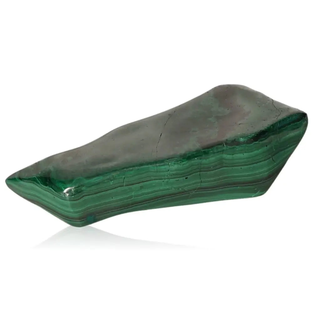 Malachite stone with rich green hues and swirling patterns, symbolizing nature's balance and transformative energy.
