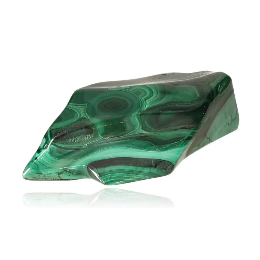 Vibrant green malachite gemstone, known as the "stone of nature," with striking patterns, symbolizing courage and hope.