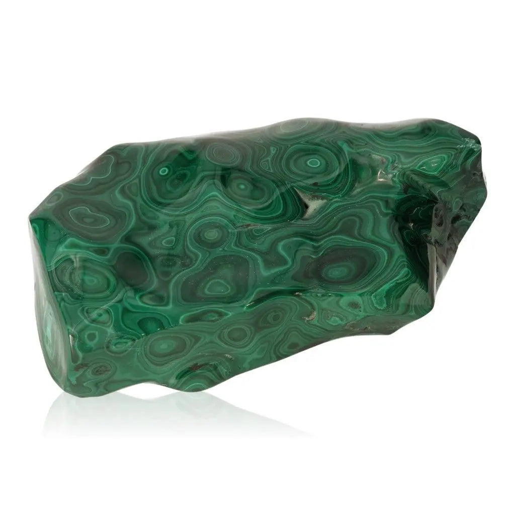Vibrant green Malachite gemstone with distinctive patterns, symbolizing tranquility and courage. Perfect for embracing positive energy.