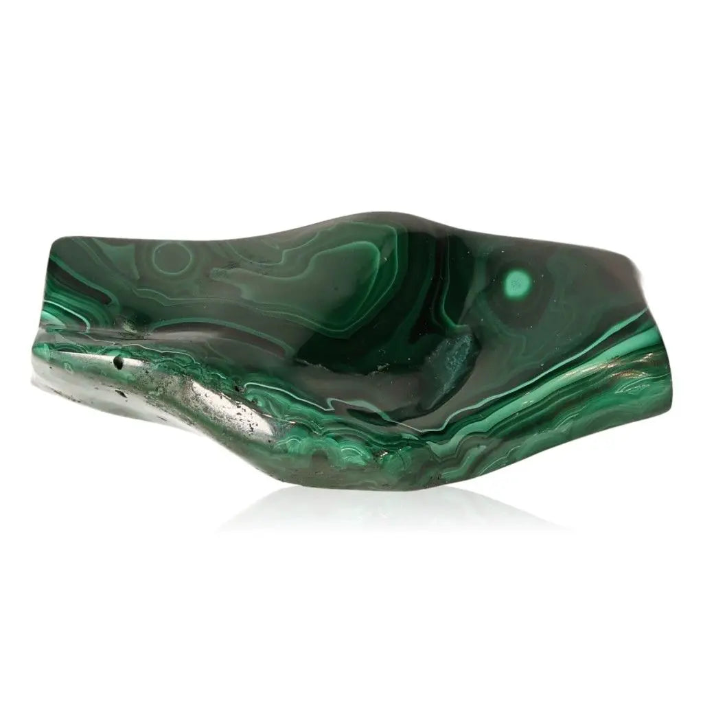 Polished green Malachite stone exuding soothing energy and natural harmony, enhancing courage and positivity in life's journey.
