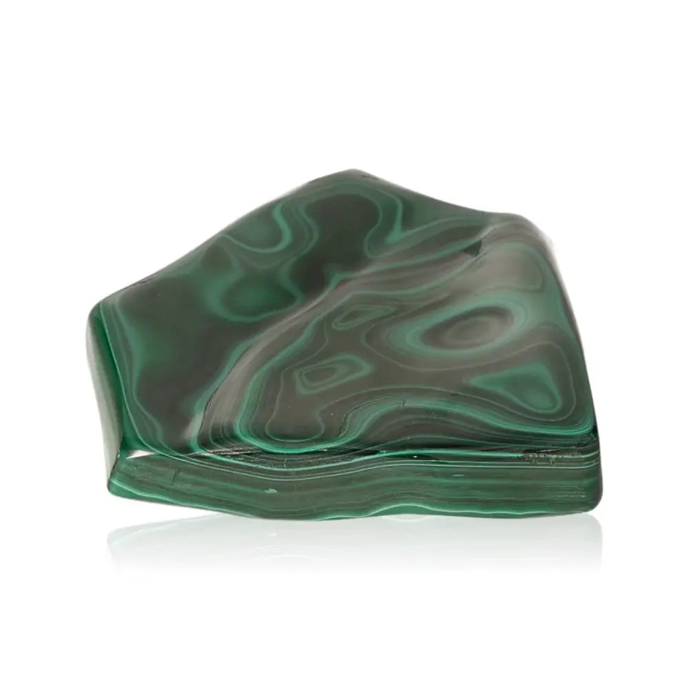 Polished malachite gemstone showcasing vibrant green hues and unique banding patterns, symbolizing nature's strength and transformation.
