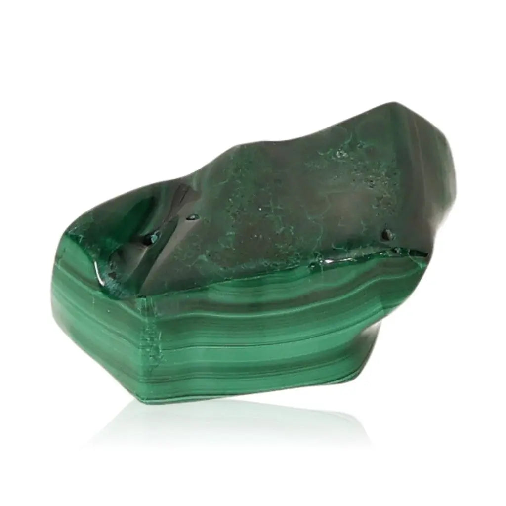 Polished green malachite crystal exuding soothing energy for courage and positivity.