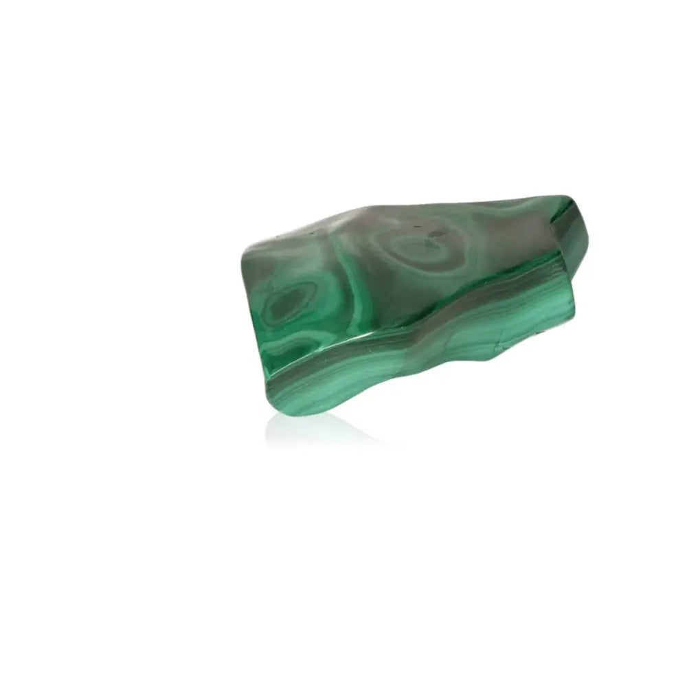 Polished green Malachite gemstone with transformative energy, offering serenity and courage for life's transitions.