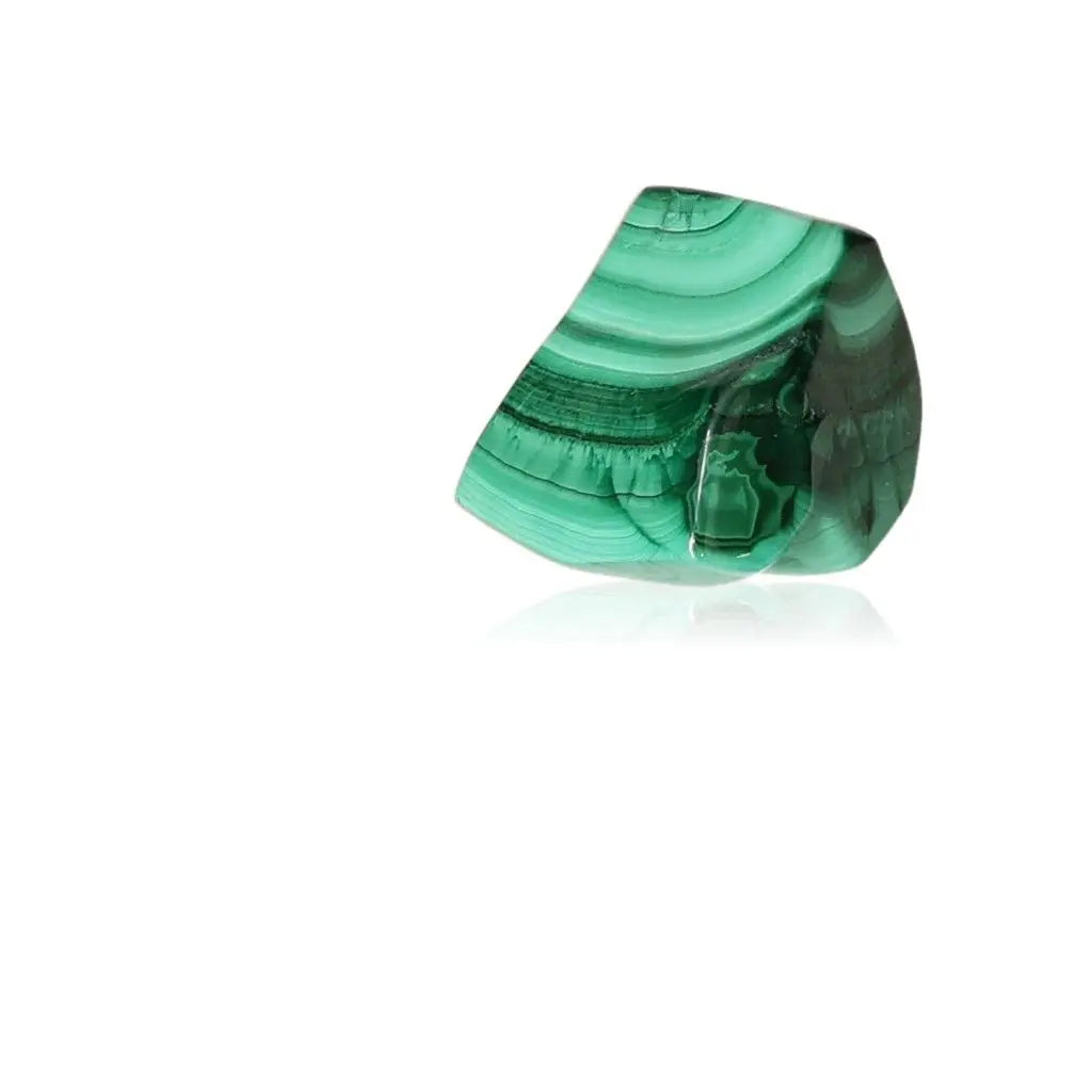 Vibrant green Malachite stone showcasing natural patterns, symbolizing transformation and serene energy for life's transitions.
