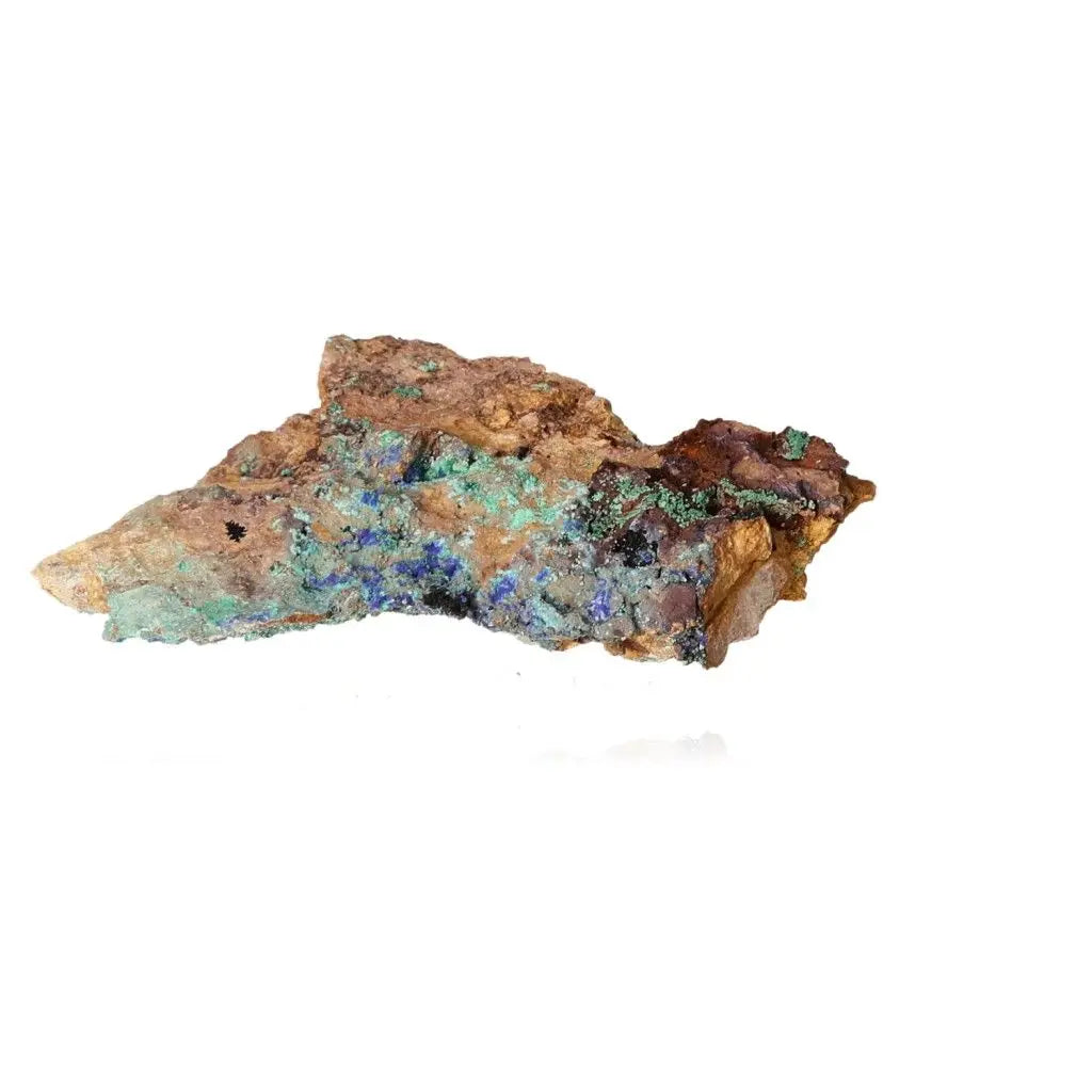 Malachite gemstone piece with vibrant green and blue swirls on a rock surface, embodying natural artistry and serene beauty.
