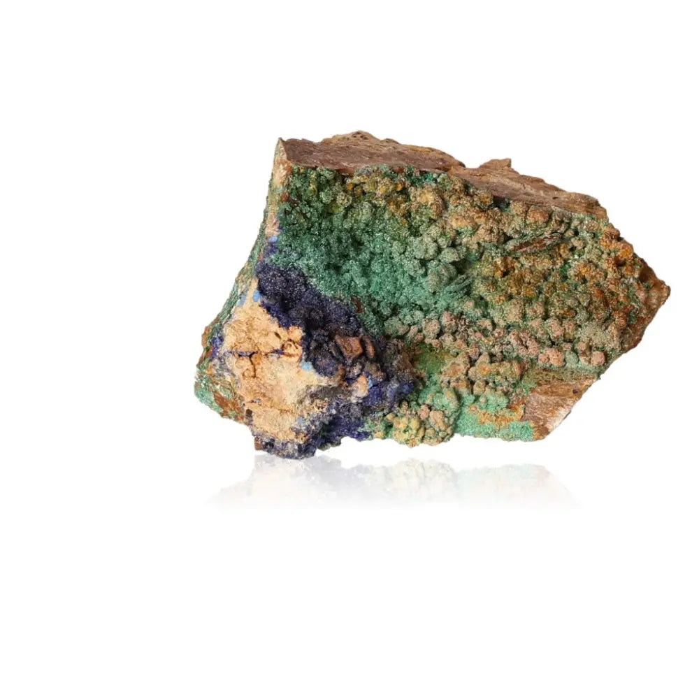Malachite druze stone showcasing vibrant green and blue patterns, symbolizing nature's storytelling and transformation energy.