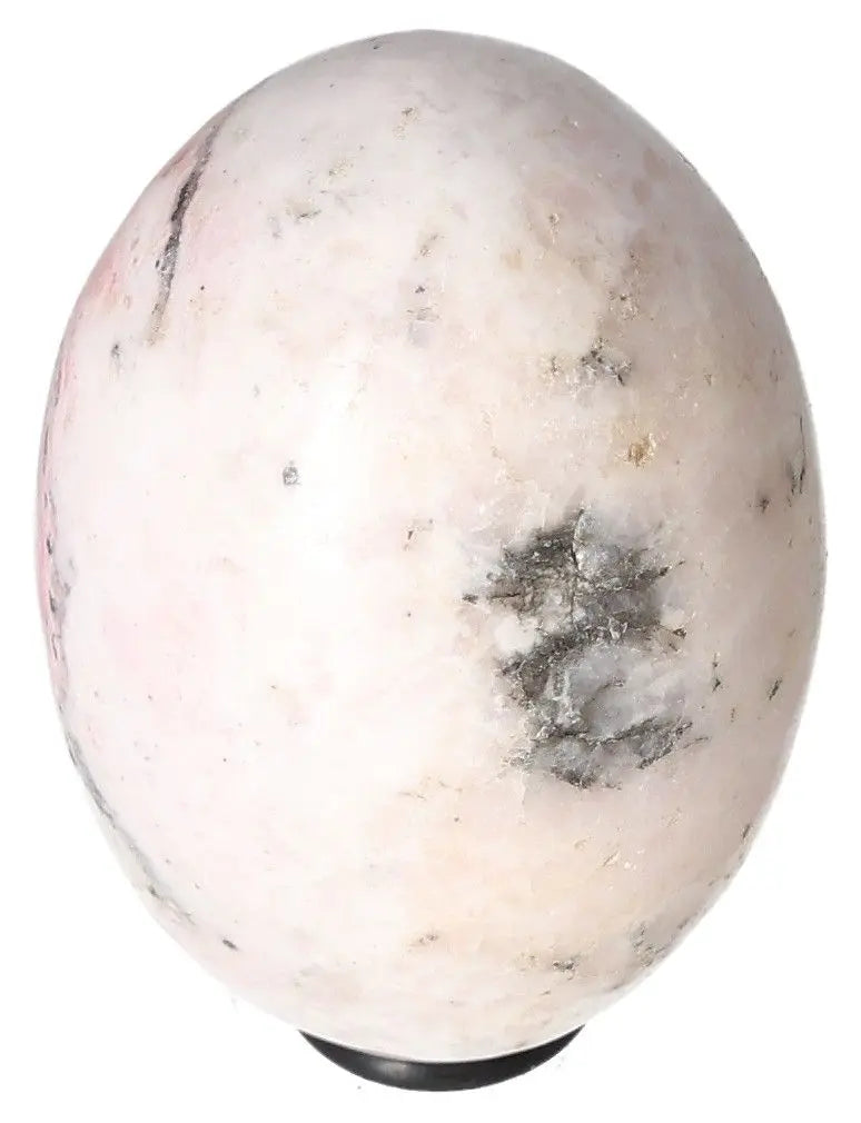 Manganocalcite egg crystal promoting peace, creativity, and energy clearing