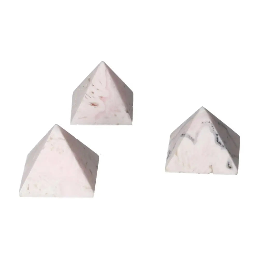 Three Manganocalcite pyramids for healing and creativity, promoting peace and clearing negative energy.