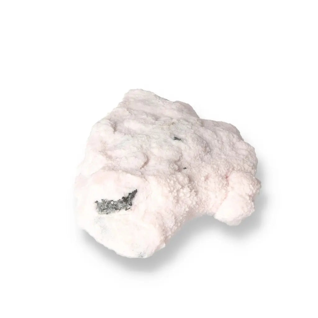 Soft pink Mangano Calcite stone promoting love, compassion, and emotional healing, known as the Stone of Forgiveness.