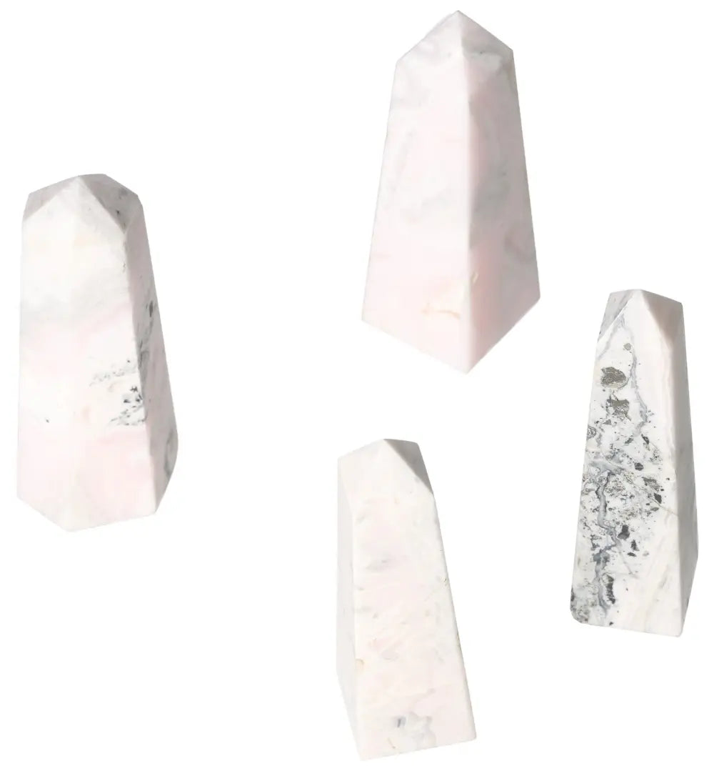 Manganocalcite tower crystals for healing, creativity, and peace, featured in four different angles, ideal for energy clearing.