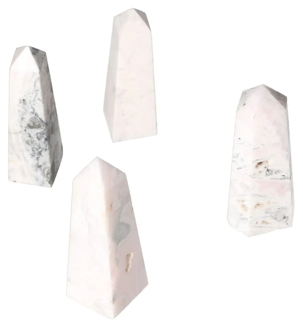 Cluster of Manganocalcite Towers, powerful healing crystals for clearing negative energy, boosting creativity, and promoting peace.