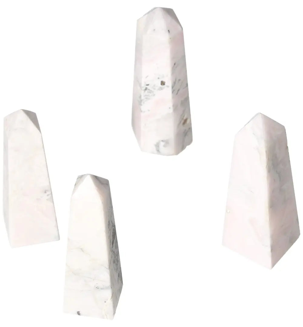 Group of four Manganocalcite Towers promoting peace and creativity