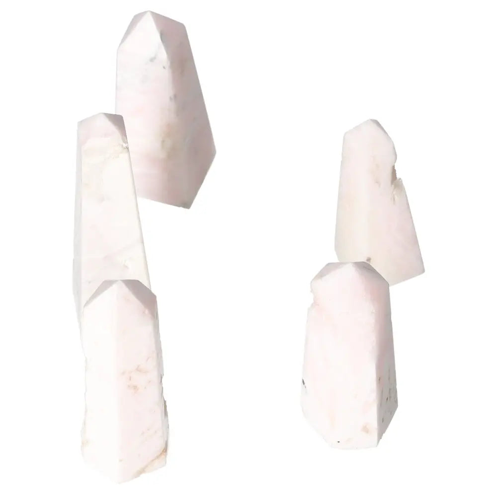 Mangano calcite towers for healing, promoting peace and creativity. Boost productivity and clear negative energy with this powerful crystal.