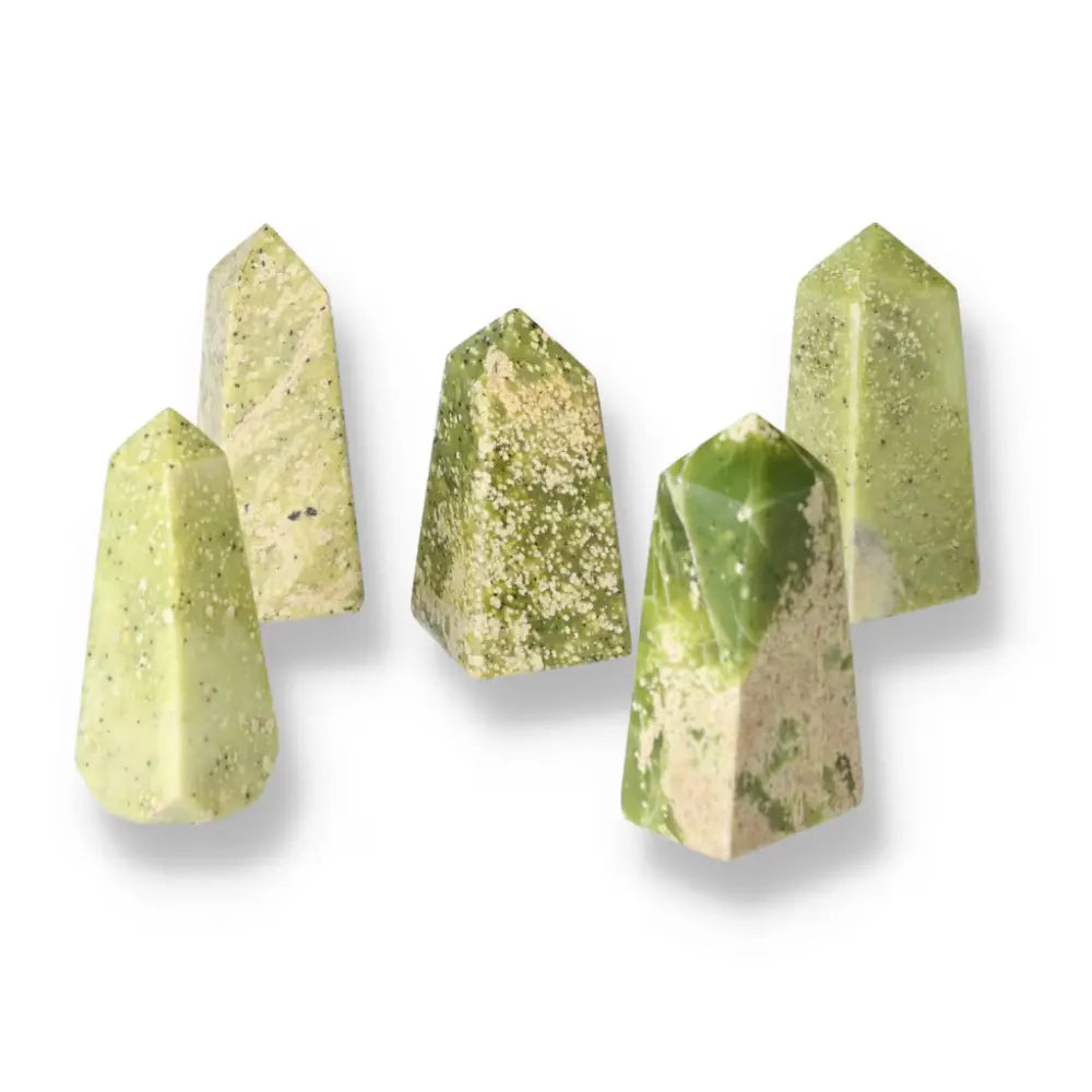 Medium Serpentine Obelisk crystals showcasing vibrant green hues for meditation, healing, and décor.