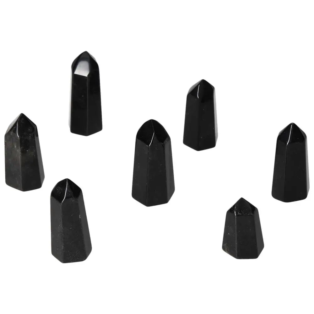 Seven mini obsidian point stones for protection, absorbing and neutralizing negative energy, enhancing spiritual health.
